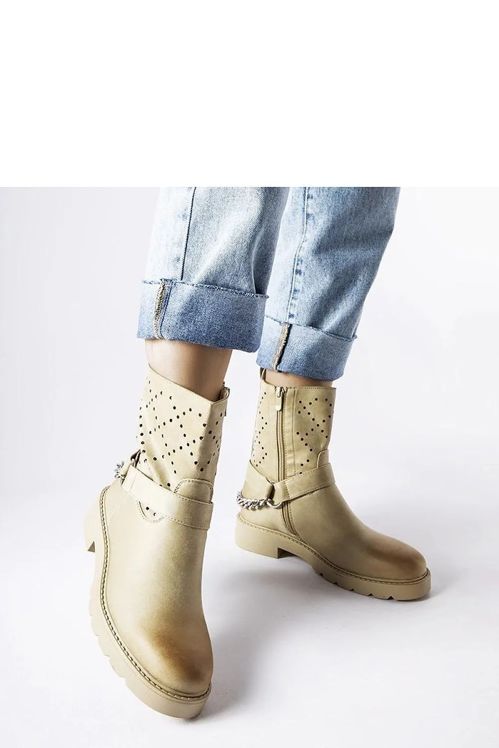 Beige openwork ankle boots with a chain